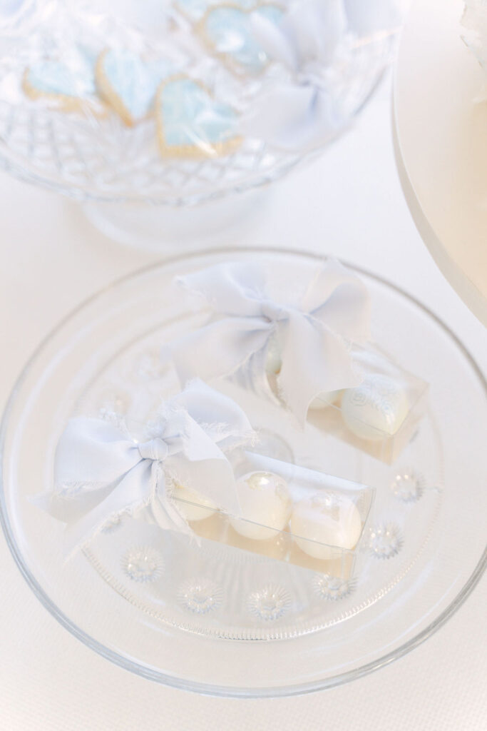 Gold-leaf topped bon-bons on glass cake plates.